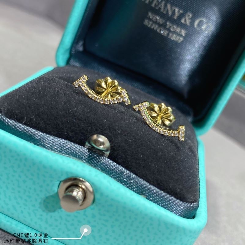T*f*ny earrings